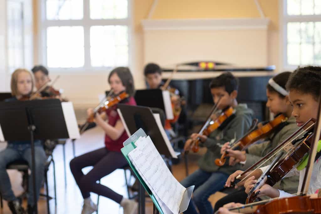 Young violinists rehearse in their chamber orchestra